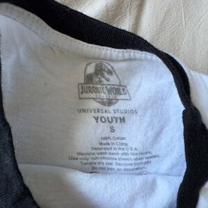 Jurassic World Youth White Tee with Black Ringer Trim